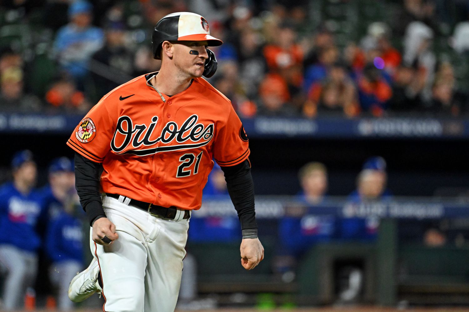 Oct 8, 2023; Baltimore, Maryland, USA; Baltimore Orioles left fielder Austin Hays (21) hits a single during the ninth inning against the Texas Rangers during game two of the ALDS for the 2023 MLB playoffs at Oriole Park at Camden Yards.